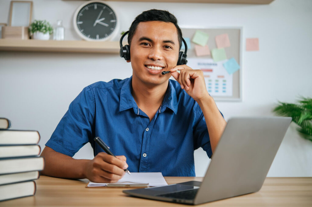 Interpreting Services 101 page with headset interpreter at laptop